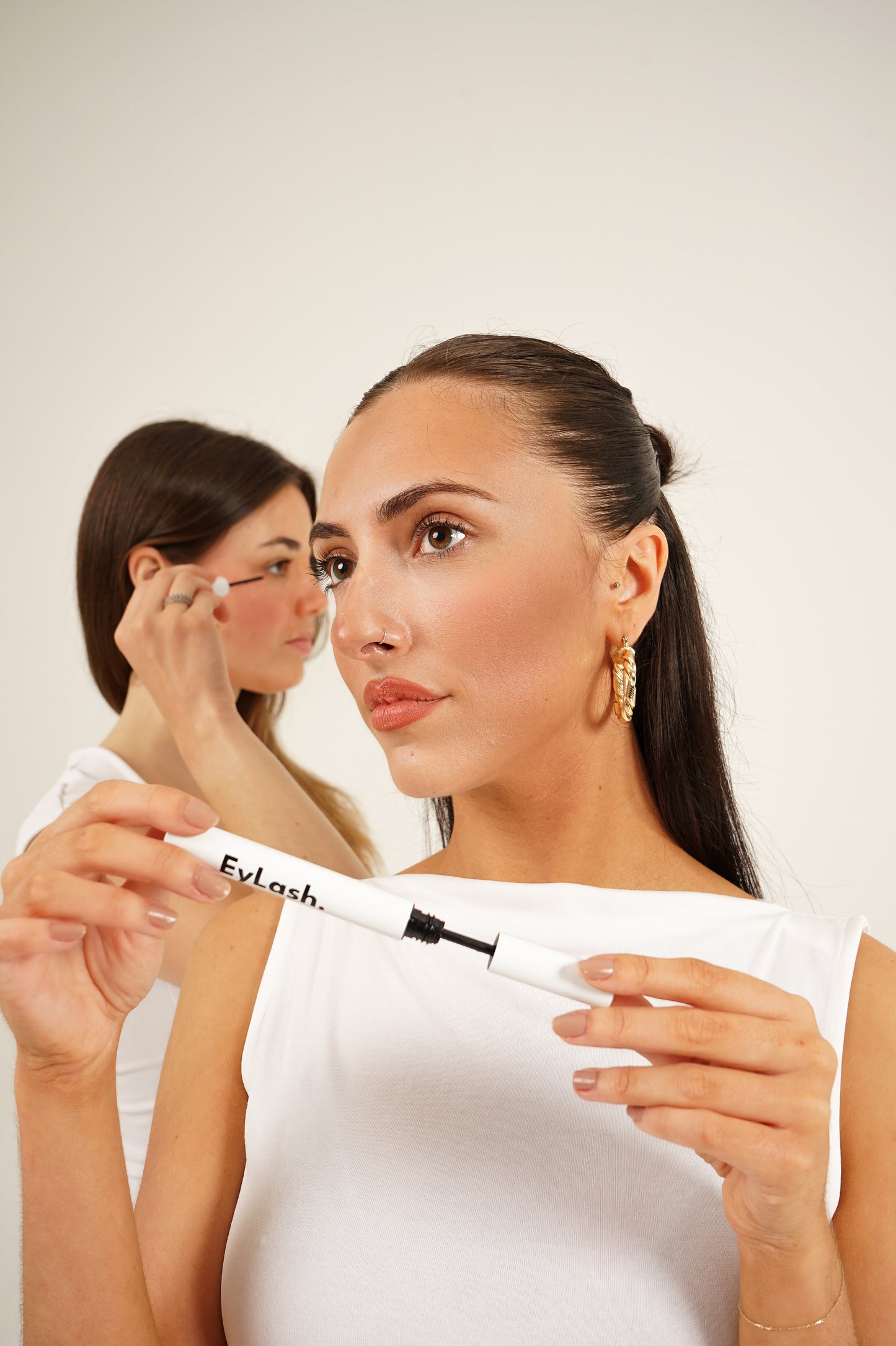 Model using EyLash Growth Serum Mascara